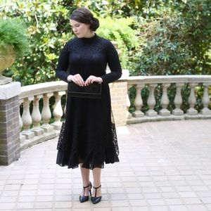 Dainty Jewell’s black dress